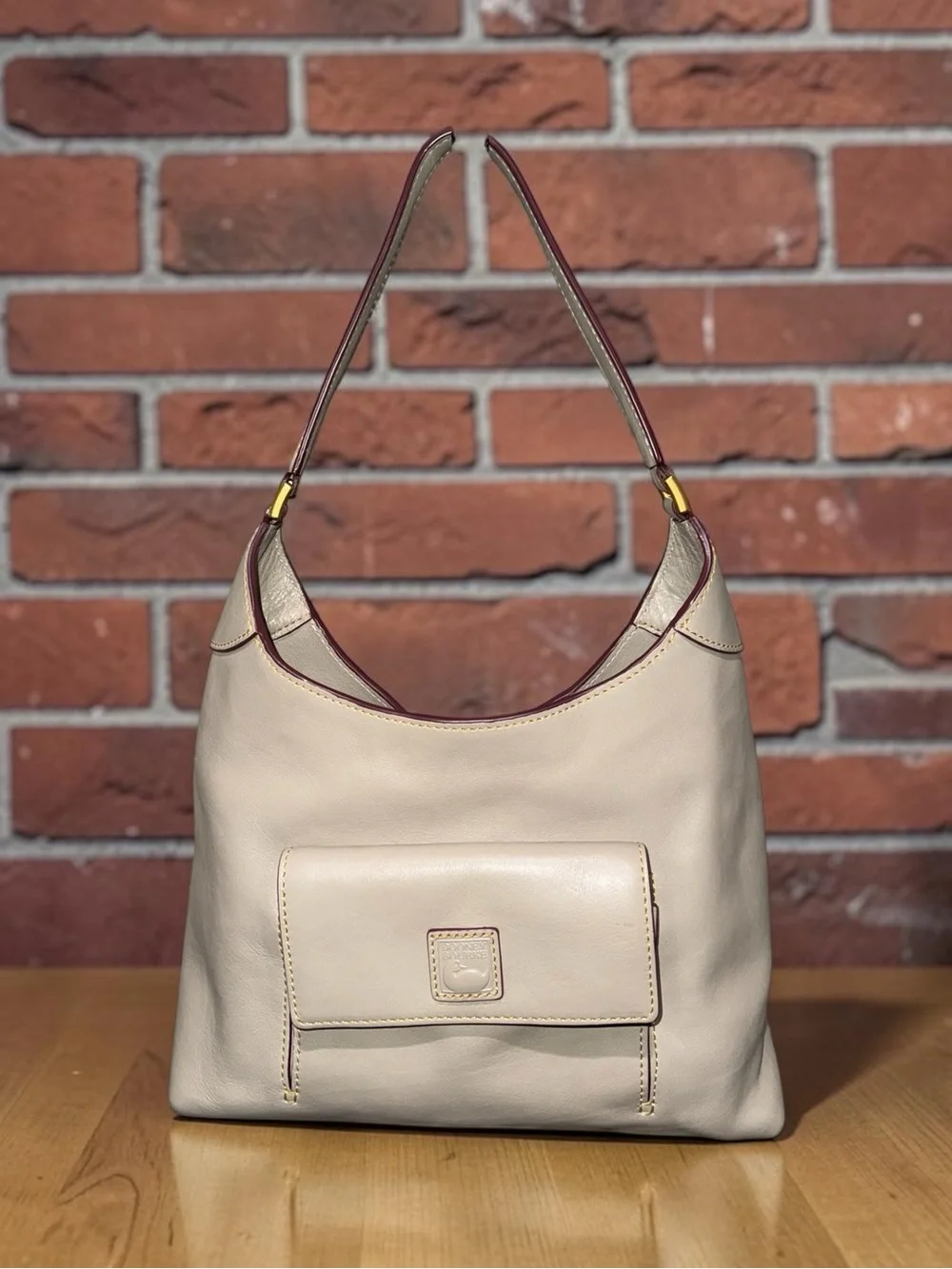 Dooney & Bourke Ecru Florentine Leather Small Hobo with tassels EUC